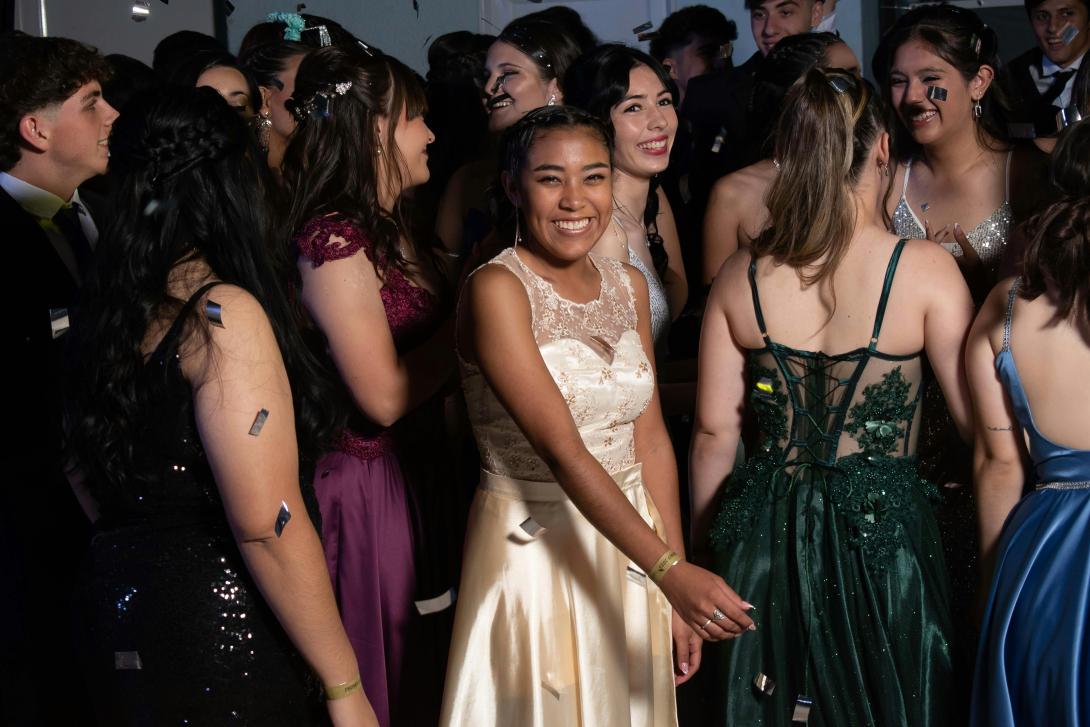 Girls dancing in prom dresses