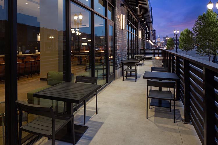 Exterior view of the patio at the Courtyard Lansing Downtown