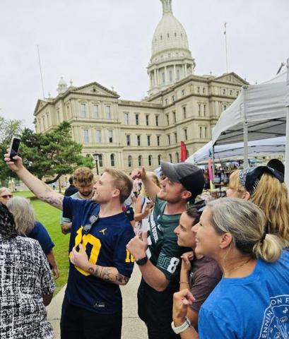 Josh & Jace pose for photos with fans at the Capitol Farmers Market